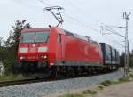 185 077-5 mit LKW Walter von Rostock-Seehafen nach  Hamburg Billwerder-Moorfleet in der Gterumfahrung bei Rostock Hbf.21.09.2011