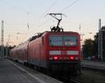 143 303-6 mit S1 von Warnemnde nach Rostock Hbf bei der Ausfahrt im Bahnhof Warnemnde.16.10.2011,Zugzielanzeige ist von 112 111-0