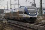 OLA79763 von Rostock Hbf nach Gstrow bei der Ausfahrt im Rostocker Hbf.06.12.2011