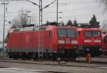 die seltenen Gste werde immer besser:diesmal war 185 011-4 stand im BW Rostock Hbf abgestellt neben an stand 112 118 keiner wollte mit denen auf die Strecke raus.08.01.2012