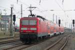 143 564-3 ex 243 564-2(DB Regio AG-Region Nordost)  Fahrzeugnutzer:Regionalbereich Mecklenburg-Vorpommern-Schwerin.Als S2   Warnende-Gstrow bei der Ausfahrt im Rostocker Hbf.20.04.2012