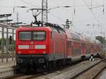 112 111 mit RE5 von Rostock Hbf nach Berlin-Sdkreuz bei der Ausfahrt im Rostocker Hbf.10.08.2012