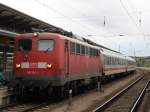 115 114-1 mit IC 1961 nach Stralsund Hbf im Rostocker Hbf.10.08.2012