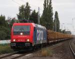 482 042-9 Mit Holzzug von Rostock-Bramow nach Borstel(Kr.Stendal)bei der Durchfahrt im S-Bahnhof Rostock-Holbeinplatz,Ab Borstel bernimmt dann die PRESS den Zug bis Niedergrne.16.09.2012