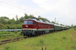 232 356 mit DPE 77114 (Wustermark - Warnemünde)bei der Durchfahrt in Rostock-Lichtenhagen.12.08.2023