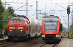 218 452-1(DB Regio Braunschweig)mit der RB nach Husum und der RBSH Lint 648 456/956 nach Kiel beim  Treffen  in Jübek.