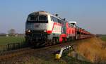 DB 218 497-6 und 421-6 mit SyltShuttle nach Westerland aufgenommen am BüTriangel bei Niebüll.