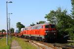 DB 218 836 + 218 397 fahren mit ihren Autozug aus Sylt in Niebüll ein 30.06.2022