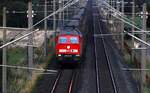 Lürschau bei Schleswig, 21:46h am 23.07.2015...die DB 233 511-5 die lautstark mit ihren Mini-Güterzug Richtung Husum dieselt festgehalten von der  So-da  Brücke zwischen Schleswig und