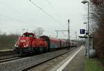 DB 1261 036-8 dieselt hier mit einer Übergabe aus Flensburg-Weiche durch Schleswig nach Neumünster.