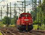 DB 1261 027-7 dieselt hier gemütlich durch HH-Harburg.