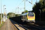 Locon 401/264 005-0 fährt hier mit dem DGS 25489(Jübek-Büchen/Straßfurt)und dem leeren Eaos Ganzzug durch Schleswig.