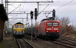 BRLL/Freightliner 653-09/ 266 118-7 mit Düngerzug und 112 159 mit RE7 nach Hamburg in Jübek.