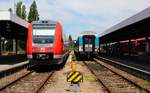 612 090/590 steht mit einem ALex nach München im Bhf von Lindau/Bodensee.