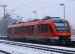 Leichter Schneefall im Norden...DB Regio 0648 354/854 als RE 74 nach Kiel verlässt hier Schleswig.