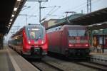 101 145-1 mit IC 2217(Stralsund-Stuttgart)bei der Ausfahrt im Rostocker Hbf neben an stand 442 358.30.11.2014