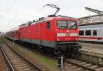 mit frischer HU WR 14.12.2015 stand 112 103 mit RE5 von Rostock Hbf nach Elsterwerda im Rostocker Hbf.20.12.2015