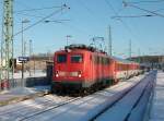 Winteraufnahme von 115 278 mit dem EC 379 Binz-Brno am 02.Januar 2011 in Bergen/Rgen.