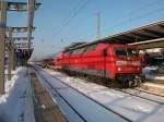 HanseExpress RE 33010 Rostock-Hamburg Hbf am 04.Dezember 2010 mit 120 203 vor der Abfahrt in Rostock Hbf.