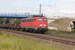 Eine DB 140 833-5 mit Ks Wagen Beladen mit Reiezugwagen Drehgestelle aufen Weg nach Bremen Durchfhrt gerade den Bahnhof Tostedt am 07.07.2011