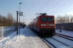 112 184-7 mit dem RE2 (RE 37412) nach Rathenow bei der Einfahrt in den Haltepunkt Berlin-Karlshorst.