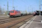 185 604-6 (HGK 2062) mit Kesselzug in Berlin-Schnefeld Flughafen.