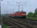 112 108-6 schob den RE 92205 nach Neustrelitz,am 19.Mai 2013,am Abzw Stralsund Rgendamm von der Hauptstrecke Stralsund-Greifswald-Berlin.