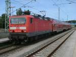 Die S1 fuhr mit der Rostocker 143 303-6 den RE 13010 Sassnitz-Rostock am 05.August 2013.Hier der Halt in Bergen/Rgen.