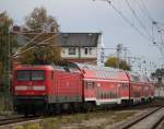 112 188-8 mit RE18590 von Berlin Hbf(tief)nach Warnemnde bei der Durchfahrt in Warnemnde Werft.19.10.2013