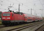 Die Cottbuser 143 306-9 stand am 15.11.2014 gegen 11:32 Uhr im Rostocker Hbf.