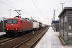 145-CL 014 (145 092-3) die fr Crossrail fhrt mit einem Containerzug in Falkenberg(Elster).