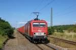 MEG 803 (156 003-6) mit Holzzug in Demker Richtung Magdeburg unterwegs.