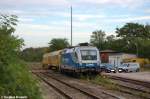 In Rathenow stand abgestellt die 1116 911-7 (182 911-8) MWB - Mittelweserbahn GmbH mit einem HSG High Speed Grinding Schienenschleifzug, von der Firma vossloh, am Haken.