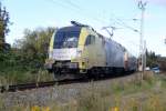 ES 64 U2-011 mit AKE Sonderzug 99 von Ostseebad Binz nach Koblenz bei der Durchfahrt in der Gterumgehung Hhe Rostock Hbf.27.09.2015