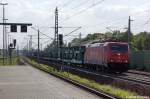 185 595-6 Crossrail mit leeren Autotransportzug in Rathenow in Richtung Wustermark unterwegs.