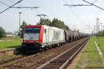 185 650-9 seid August 2011 bei der RBB - Regiobahn Bitterfeld Berlin GmbH mit einem Benzin Kesselzug am Haltepunkt Leuna Werke Sd und fuhr in Richtung Merseburg weiter.