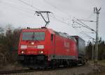 185 281-3 mit KLV Zug 43761 von Rostock Seehafen nach Novara bei der Durchfahrt um 13:44 Uhr in der Gterumfahrung in Hhe Rostock Hbf