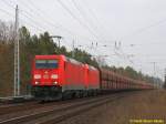 185 349 mit 185 xxx mit Kohleganzzug in Berlin-Friedrichshagen auf dem Weg nach Westen am 20.02.2015