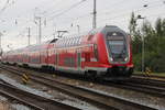 445 009-7+Twindexxwagen DBpza 782.1+445 006-3 als RE 5(4352)von Elsterwerda nach Rostock Hbf bei der Einfahrt im Rostocker Hbf.27.05.2018