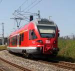 RE 13008 von Sassnitz nach Rostock Hbf bei der Einfahrt im Rostocker Hbf.12.07.2013