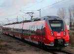 442 837-1 als S 1 von Rostock Hbf nach Warnemnde bei der Einfahrt im Haltepunkt Warnemnde Werft am 23.12.2013