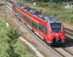 442 849 als S1 von Rostock Hbf nach Warnemnde bei der Einfahrt im Haltepunkt Warnemnde Werft.04.07.2015