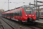 442 344-8 als RE9(RE 13011)von Rostock Hbf nach Sassnitz kurz vor der Ausfahrt im Rostocker Hbf,neben an stand wieder der versptete IC 2213.16.10.2015