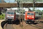 DB Flickenteppich 101 141-0 als Schublok eines unbekannten IC's und die 185 190-6 mit einem Drahtrollentransport beim  Treffen  in HH-Harburg.