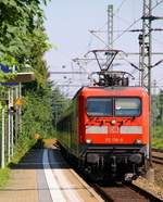 DB Regio 112 178-9 hat mit einem 6 n-Wagen SH-Express Einfahrt in Schleswig.