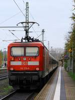 112 175-5 mit SH-Express nach Flensburg kurz vor seinem Halt in Schleswig.