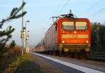 112 173-0 mit einem SH Express nach Hamburg hier festgehalten bei der Abfahrt in Schleswig.