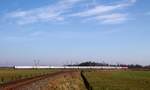 DB 120 118-5 mit dem IC 2417 von Flensburg nach Köln aufgenommen zwischen dem Bü Jübek-Nord und dem Bhf Jübek, Standort Bü Sollbrück I(KBS 134).09.03.2014 