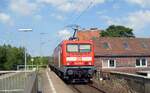 DB 143 276-4 als Schublok einer RB nach Flensburg aufgenommen bei der Ausfahrt Hp Flensburg-Weiche am 01.07.2008