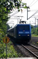 PRESS 145 023-6(145 083-2, ex SBB 481 001)mit dem DPE 5199 aus Hamburg festgehalten bei der Durchfahrt in Schleswig(leider bei absolutem Gegenlicht).